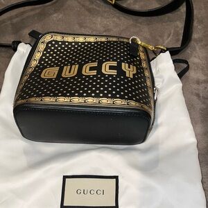 Gucci Black and Gold Logo and design New with COA